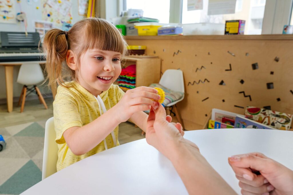 ABA therapy session using positive reinforcement with a child.