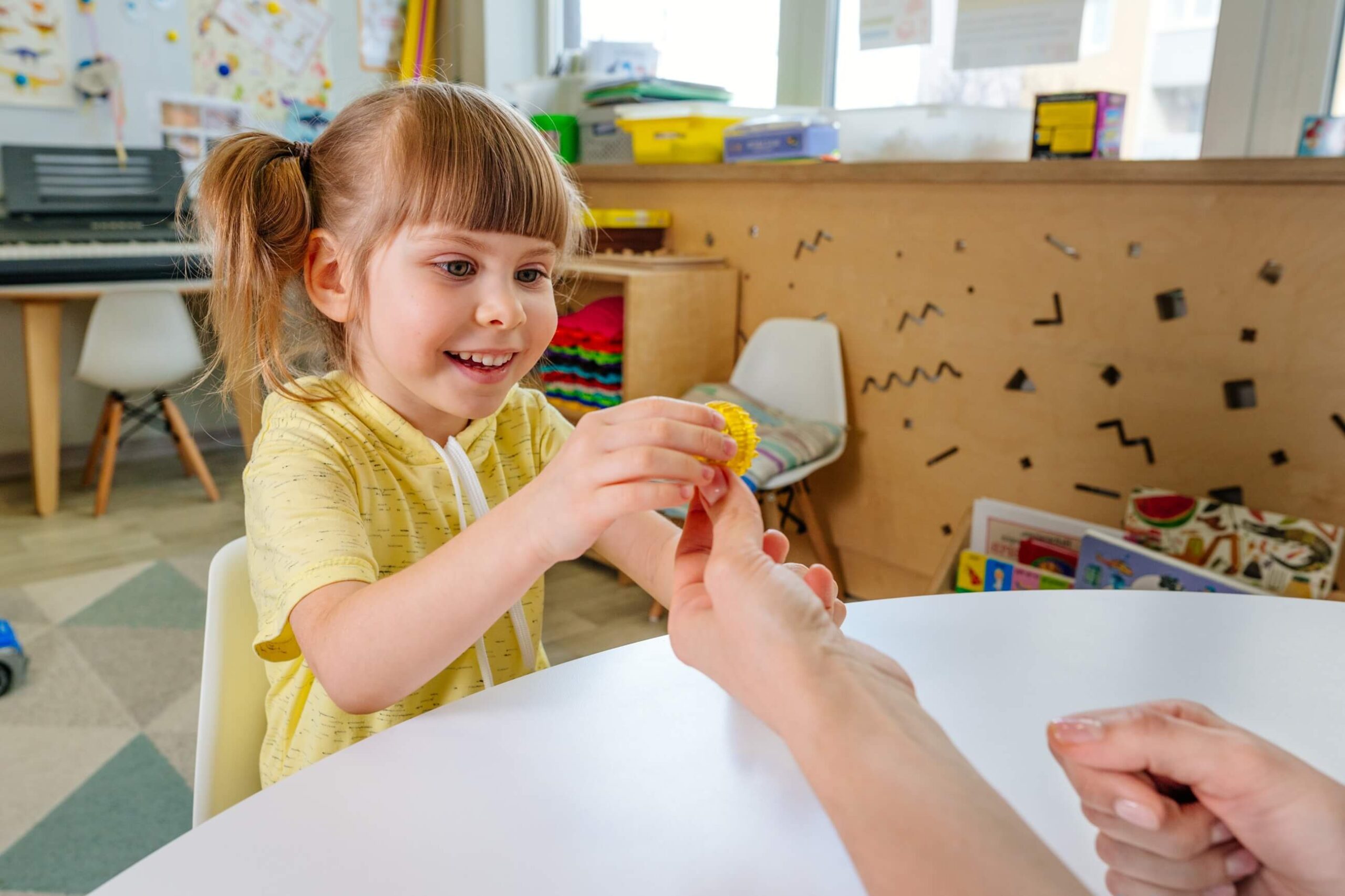 ABA therapy session using positive reinforcement with a child.